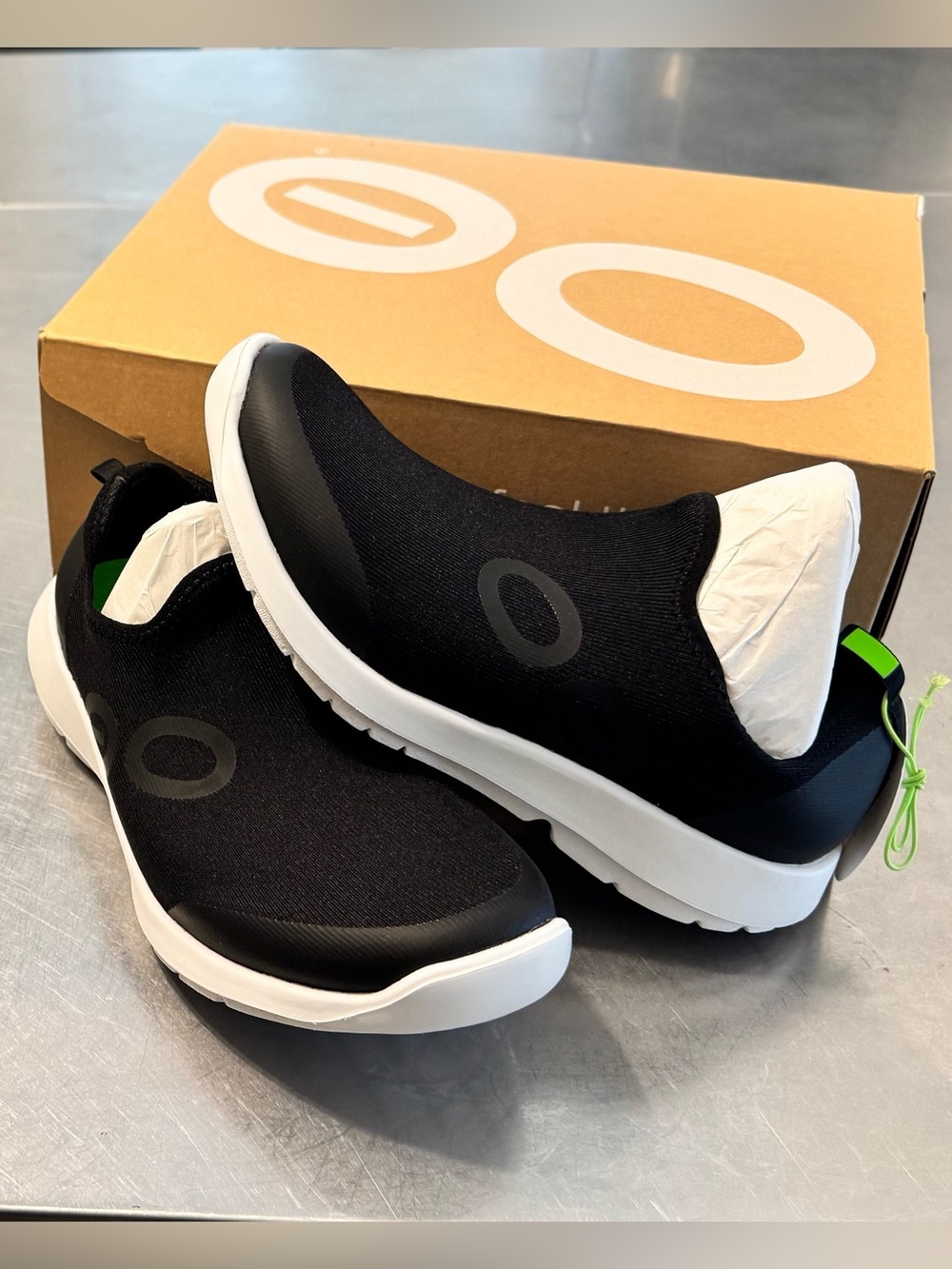 OOFOS Women's Black Slip-On Athletic Shoes with White Sole
